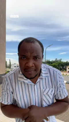 A man looking into the camera