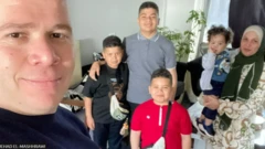 جهاد، همسر و چهار پسرش در خانه‌شان قبل از جنگ