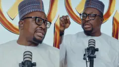 Adẹrin-inpoṣonu Ali Baba wa aṣọ buba funfun pẹlu fila lori