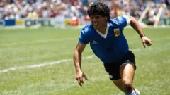 Diego Maradon celebrates against England