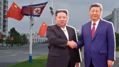 金正恩和習近平握手
