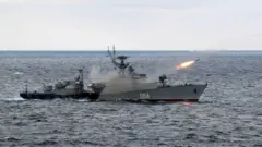 A ship fires a missile in the Black Sea