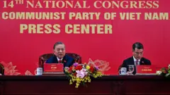 Ông Tô Lâm (trái) tại họp báo sau đại hội 