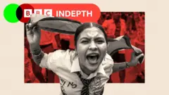 A demonstrator shouts during a protest outside the Parliament in Kathmandu