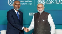 మయిజ్జు, మోదీ ఫోటో 