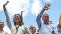 A líder da oposição, María Corina Machado com o candidatocbet logo pngoposição à Presidência, Edmundo González