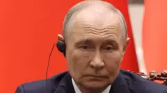 Путін