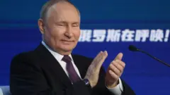 путін