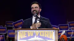 Zohran Mamdani for stage wey dem write New York is Not for Sale on top