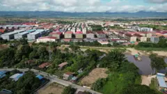 This aerial photo taken on September 17, 2025 shows the KK Park complex in Myanmar's eastern Myawaddy township, as pictured from Mae Sot district in Thailand's border province of Tak. 