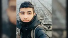 Сирийский беженец Халил