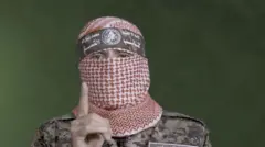 الناطق باسم كتائب القسام الذراع العسكرية لحركة حماس أبو عبيدة