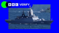 Image of a ship in the sea with another ship in the background