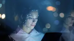 Woman using facial recognition technology 