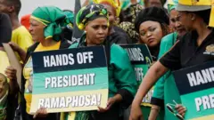 women carry placard