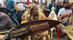 One South African man wear dia traditional attire