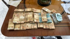 Imagem de dinheiro apreendido em operação da Polícia Federal contra o PCC