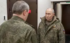 путін