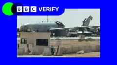 A grey USAF E-3 Awacs plane which has been torn in two after a reported Iranian attack at an air base in Saudi Arabia