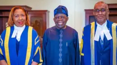President Bola Tinubu and two goment personnel from Saint Lucia