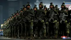 North Korean troops marching in a military parade in Pyongyang
