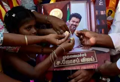 Party Workers of Tamilaga Vettri Kazhagam (Maharashtra) in Dharavi celebrate after Joseph Vijay Chandrasekhar took oath as the Chief Minister of Tamil Nadu, on May 10, 2026 in Mumbai, India.