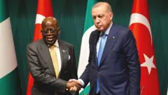 Bola Tinubu shaking Recep Tayyip Erdoğan 