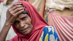 በድርቅ ምክንያት ተፈናቅለው በመጠለያ ውስጥ ከሚገኙ ሶማሊያውያን መካከል አንዷ 
