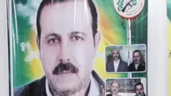 Foto de Mahmoud al-Mabhouh em um poster