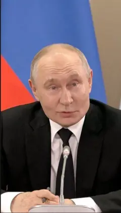 Путін