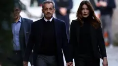 Nicolas Sarkozy e sua esposa, Carla Bruni-Sarkozy