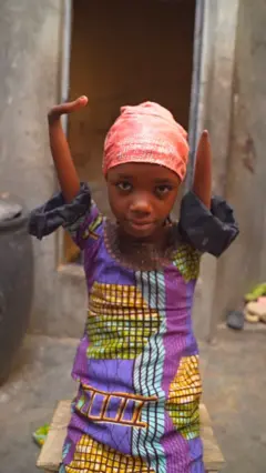 Aisha raise her hands