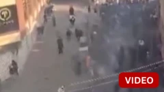 இரானில் மோதலின்போது வீசப்பட்ட கண்ணீர் புகைக் குண்டுகள்