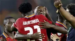 Joueurs namibiens célébrant leur victoire.