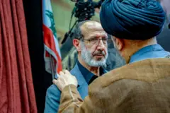 النائب في حزب الله ابراهيم الموسوي يسلم على رجل دين 