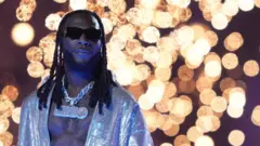 Burna Boy mu giteramo imbere y’urukino rwa nyuma rwa Champions League ya UEFA hagati ya Manchester City na FC Internazionale ku kibuga ca Ataturk Olympic Stadium, Istanbul, Turkiya itarki 10/06/2023