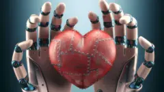 የሮቦት እጅ እና የልብ ቅርጽ