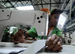 In this picture taken on November 24, 2008, Sri Lankan garment workers manufacture items for British retailer Marks and Spencers at a factory in Seeduwa , some 30kms north of Colombo. Sri Lanka's clothing exporters are joining the 'green' race by investing millions of dollars to upgrade factories and curry favour with foreign consumers who are environment-conscious