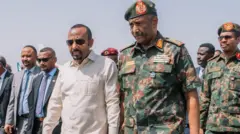 ጠቅላይ ሚኒስትር ዐቢይ እና ሌተናንት ጄኔራል አል-ቡርሐን