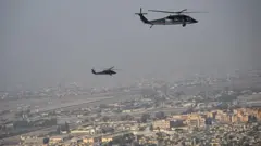 Helikooptaroota Ameerikaa 'Black Hawk' Muddee 2024 keessa Bagdaad keessa balali'aa turan