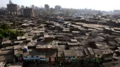 தாராவி, மும்பை, அதானி குழுமம், 