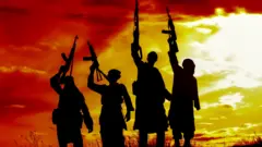 Graphic photo of armed men