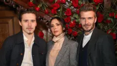 Brooklyn, Victoria e David Beckham