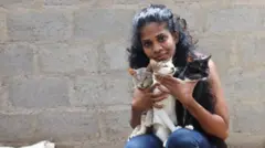 Thilini and her cats