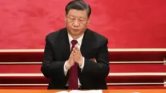 Xi