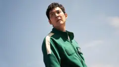 Lee Jung-jae memerankan Seong Gi-hun