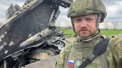 El bloguero proguerra Alexander Kots en Ucrania