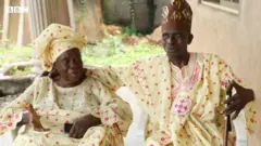 Aworan Dominic Ayinde Abioudun Enitan ati iyawo wọn Celilia Enitan