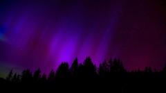 The Aurora Borealis is visible at the Col des Moses Pass in Switzerland