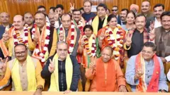उत्तर प्रदेश से बीजेपी उम्मीदवारों के साथ मुख्यमंत्री योगी आदित्यनाथ और अन्य नेता